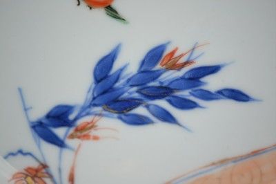 An almost 100% mint Chinese porcelain plate famille rose scroll with 