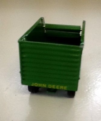 Diecast JOHN DEER by ERTL Minature Farm Equipment   4 pieces  