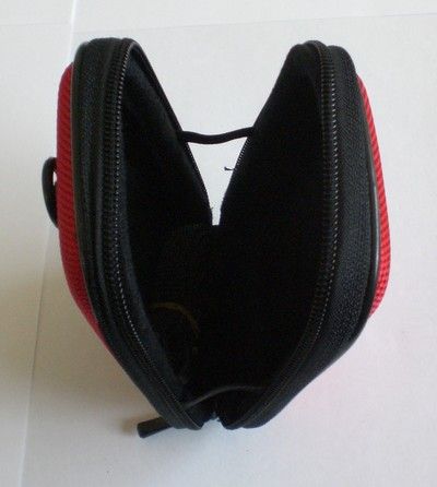 This is a CLEARANCE sale of a red camera hard pouch. The pouch has a 