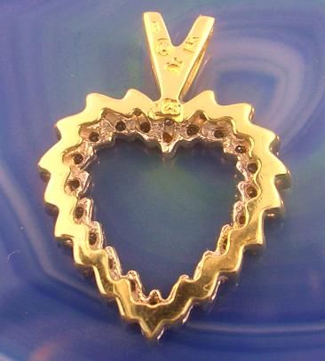 This is a wonderful 14kt YELLOW GOLD, (stamped), DIAMOND HEART PENDANT 