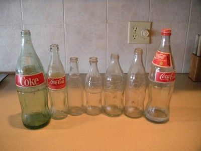 LOT OF 7 RARE VINTAGE ASSORTED COCA COLA GLASS BOTTLES  